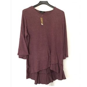Mauve sweater with bell sleeves and ruffles bottom
